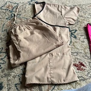 Never worn Scrub set top and bottom size medium